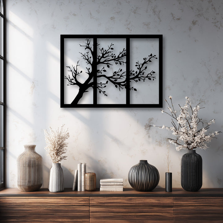 The sleek black finish of this modern nature tree silhouette triptych metal decoration wall art offers a dramatic contrast.