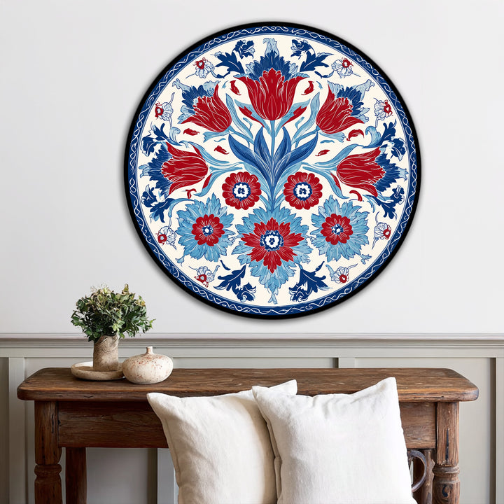 Visual rhythm repeats the vibrant red and blue floral motifs in this Ottoman-style round oil painting wall art, creating a striking and balanced decorative design.