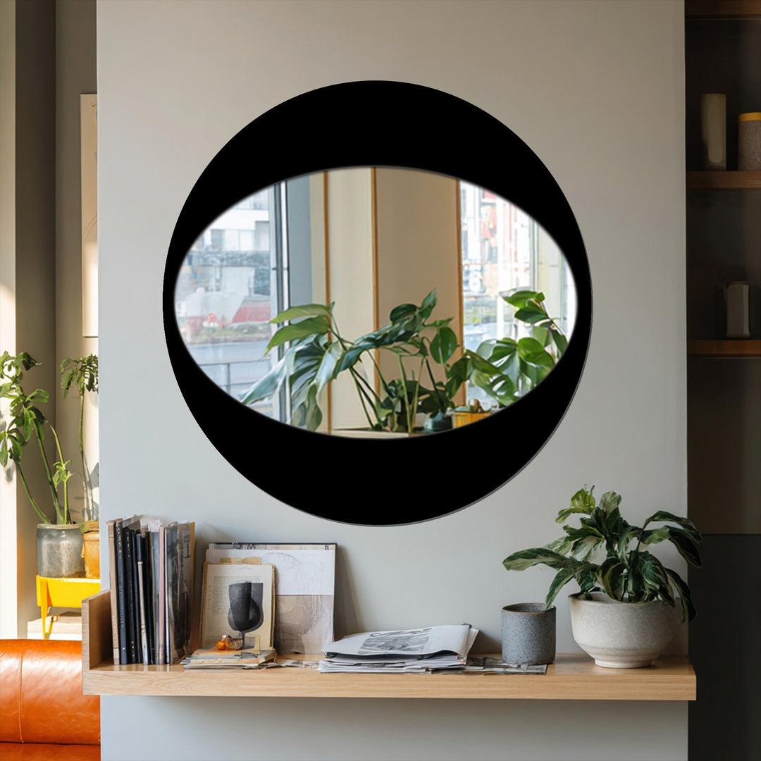 Round wall mirror with black arc frame