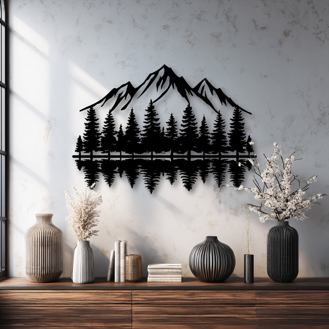 Focusing on depth and layers, this captivating metal artwork features intricate mountain and forest silhouettes with a mirrored reflection, creating striking visual depth.