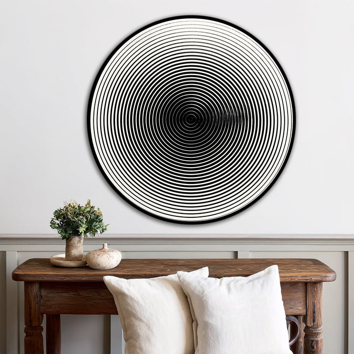 The mesmerizing focal point of this round wooden minimalist oil painting wall art showcases hypnotic black lines creating a striking contrast and visual depth.