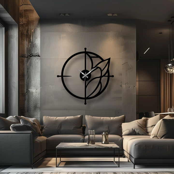 Rough surface texture highlights the elegant design of this modern leaf accent circular decorative metal art clock, with subtle variations creating a visually engaging piece.