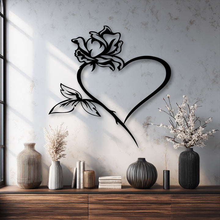 The subtle layering effect from the shadows cast by the intricate rose heart unique metal wall art adds depth and dimension to the wall.