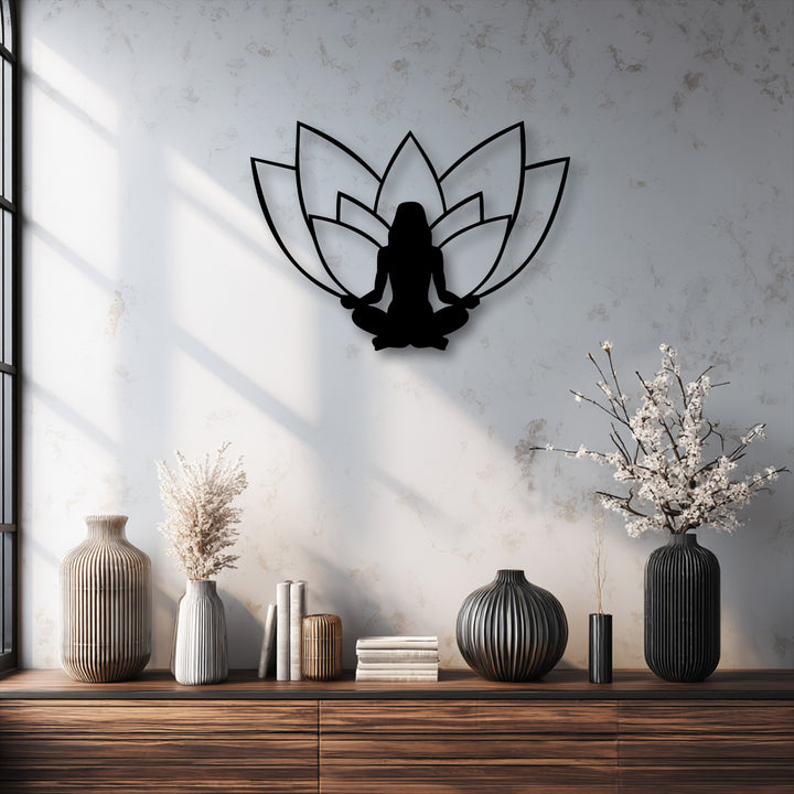 The distinct sharp edges and smooth borders define the elegant Lotus Meditation Silhouette metal wall decor, creating a serene visual.