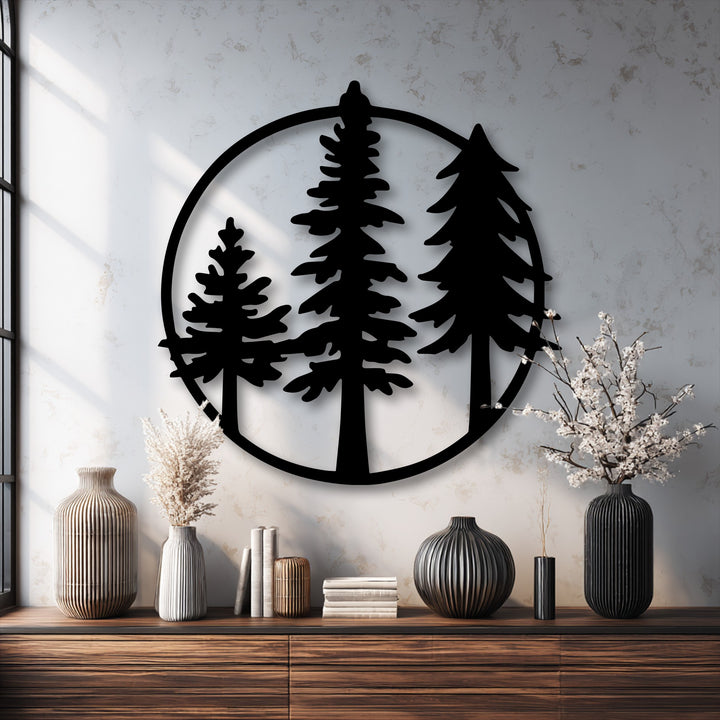 Feathery pampas grass stands delicately on a wooden dresser beside a minimalist evergreen circle metal art for wall, creating a serene, natural vignette.