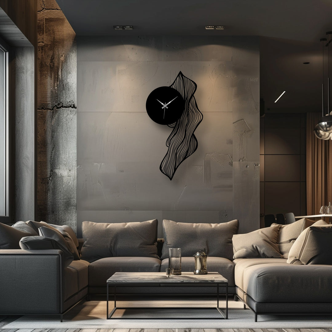Softly draped cushions enhance the comfort of this modern sectional near a flowing abstract leaf metal wall clock, bringing unique decoration wall art to the home.