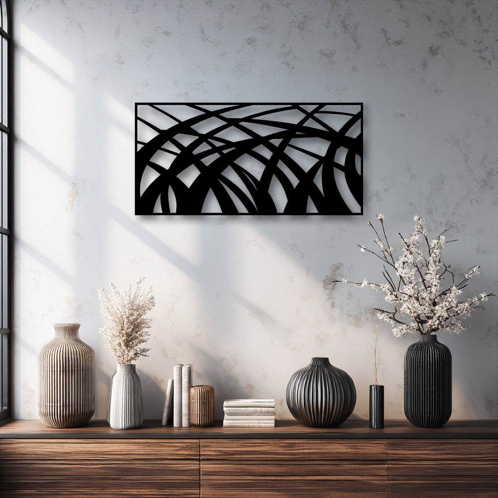 Organic forms are highlighted in this unique metal wall art with abstract flowing lines, complemented by striated vases and delicate blossoms.