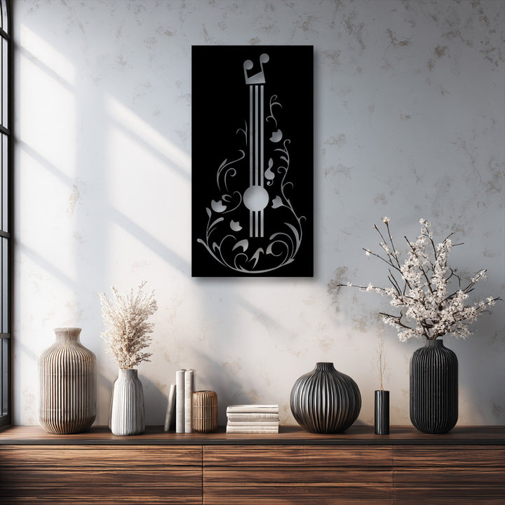 Visual rhythm beautifully defines this elegant metal artwork, a music-inspired floral guitar design with flowing lines and harmonious notes.