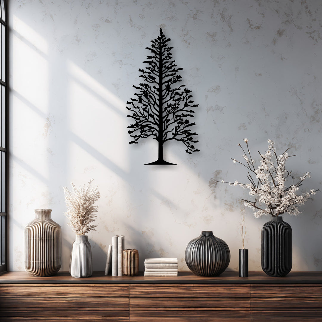 Strong color contrast defines the black Majestic Pine Tree Silhouette Metal Wall Art against the light, textured wall, presenting captivating decorative metal art.