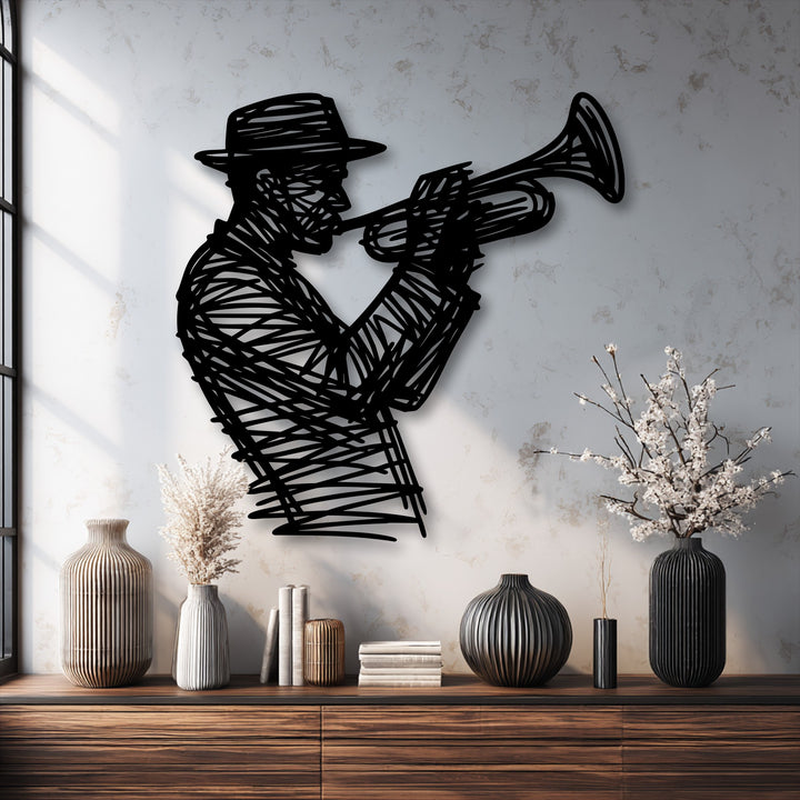 The jazz trumpet player's silhouette, crafted as decorative metal art, creates a dynamic visual rhythm with its etched lines and musical subject.