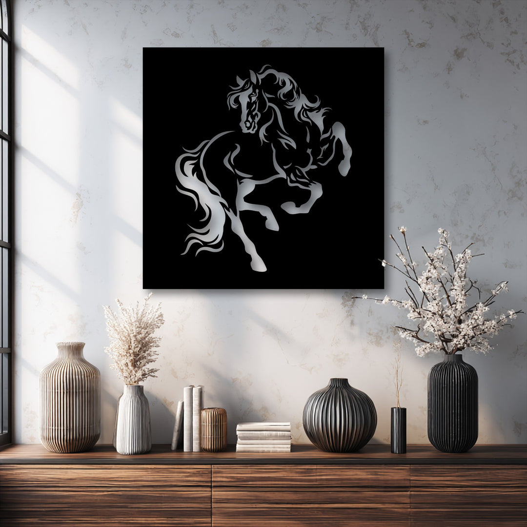 A powerful and elegant rearing horse silhouette defines this unique metal wall art against a black background.
