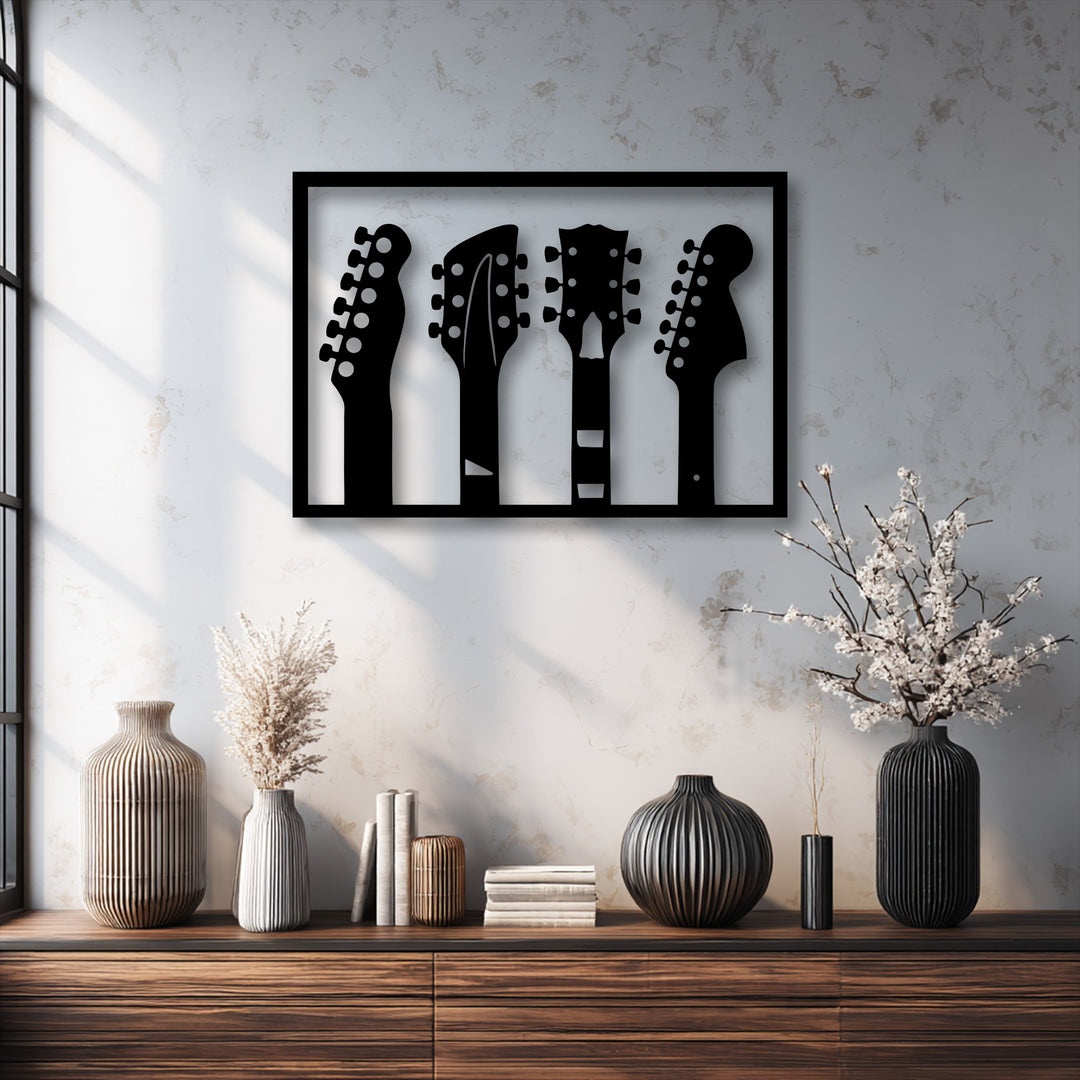 The warmly lit scene features decorative metal art of guitar headstock silhouettes above a dark wood console, flanked by ribbed vases.