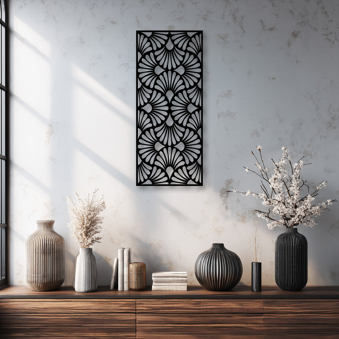 The serene and elegant mood of this room is enhanced by the unique metal wall art featuring a sophisticated Art Deco fan pattern.