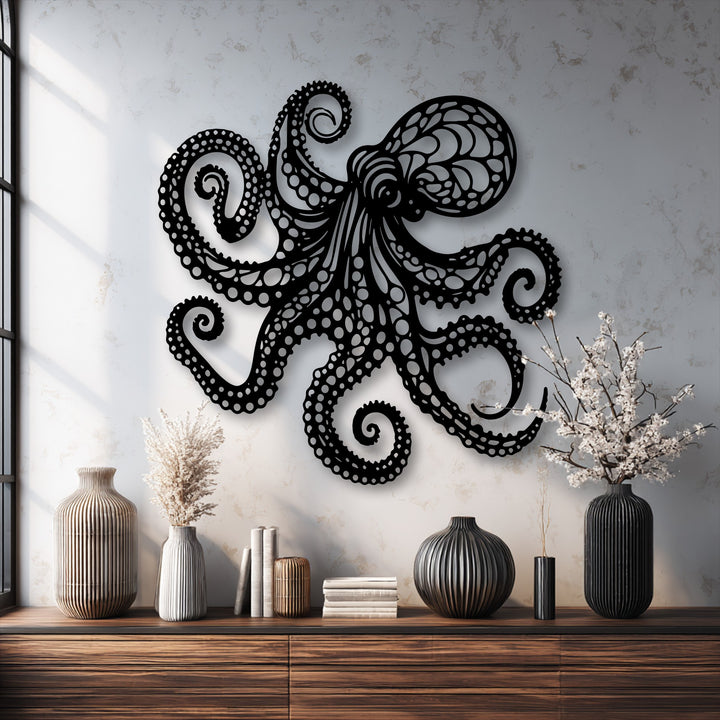 The abstract quality of the detailed black octopus decorative metal art features swirling tentacles and intricate patterns, creating striking wall shadows.
