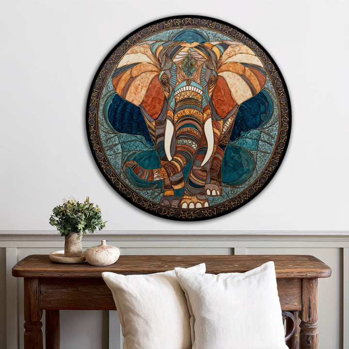 Negative space surrounds the elephant in this circular oil painting wall art, creating a framed silhouette against the lighter wall.