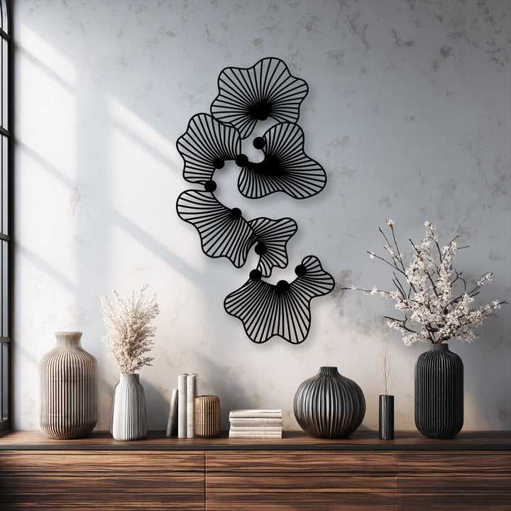 Visual rhythm flows through the modern line flower design of this abstract floral metal wall decor, creating a captivating display.