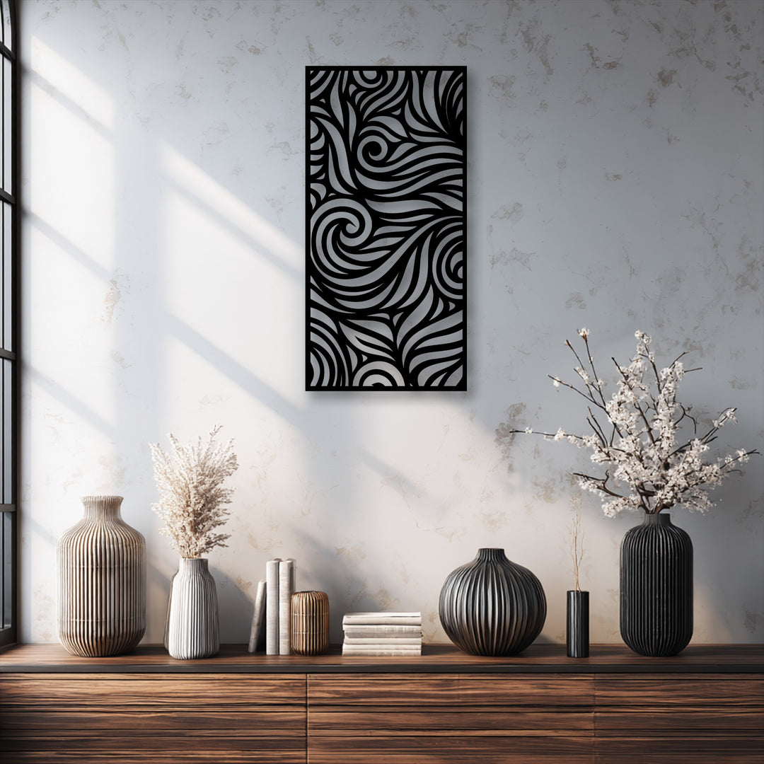 The sharp outer edges and internal borders of the unique metal wall art create a striking abstract flow pattern.