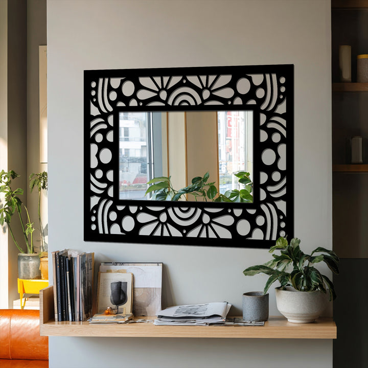 Visible in the background is a window reflecting an urban scene, enhancing the art deco floral pattern frame modern wall mirrors.