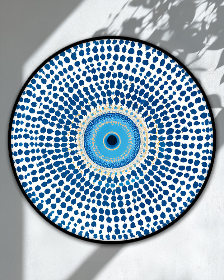 Featuring a black circular frame, this unique canvas print accentuates a blue evil eye mandala design, making it a striking and protective symbol with defined borders.