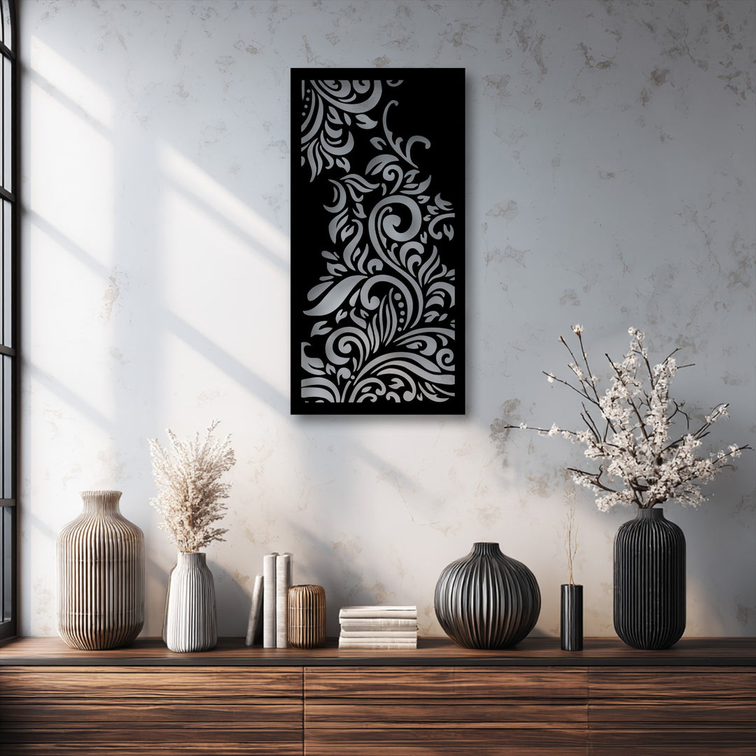 The ornamental floral swirl decorative metal art creates a striking layering effect with its metallic cut-out design over a dark background.