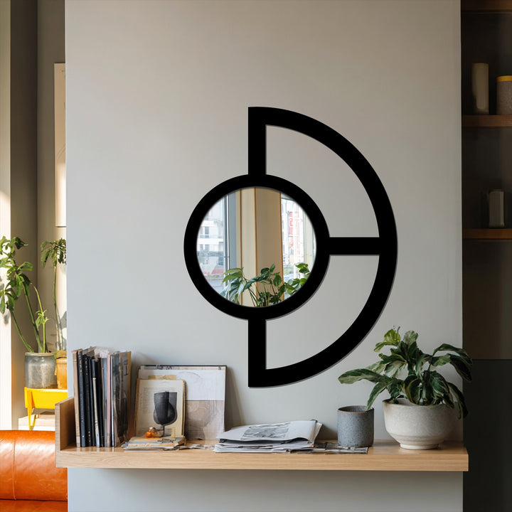 Bold black outlines define the abstract half circle design of this decorative metal art mirror, creating a visually striking and modern wall mirrors statement piece.