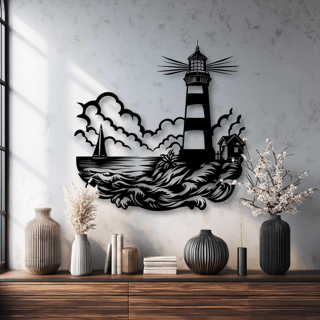 The stillness of this detailed metal artwork captures a serene coastal lighthouse scene, featuring ocean waves and a lone sailboat.