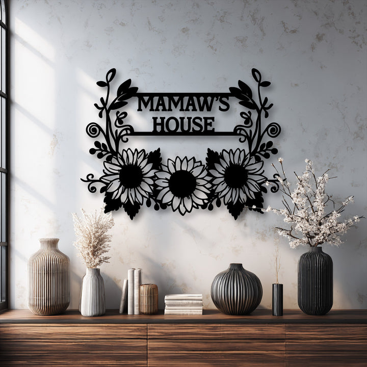 The personalized sunflower metal artwork creates a harmonious visual rhythm with its symmetrical floral patterns and elegant custom lettering.