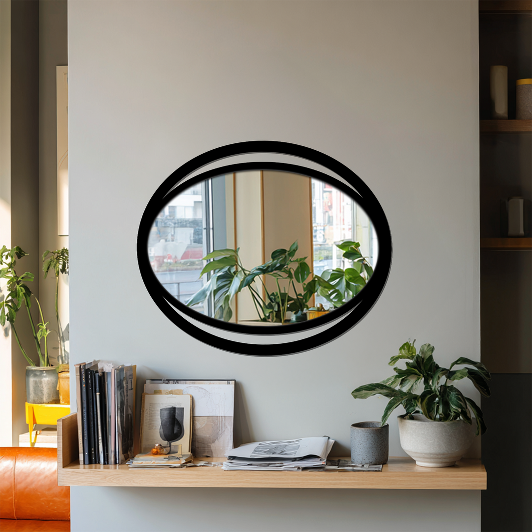 Capturing the abstract quality, the sleek modern double eclipse oval wall mirror showcases a captivating, artistic reflection that elevates decorating with wall mirrors.