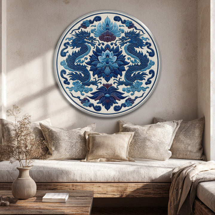 The stillness of a round oil painting art piece is evoked with twin royal blue dragons circling floral motifs, bringing a sense of calm elegance as home decor.