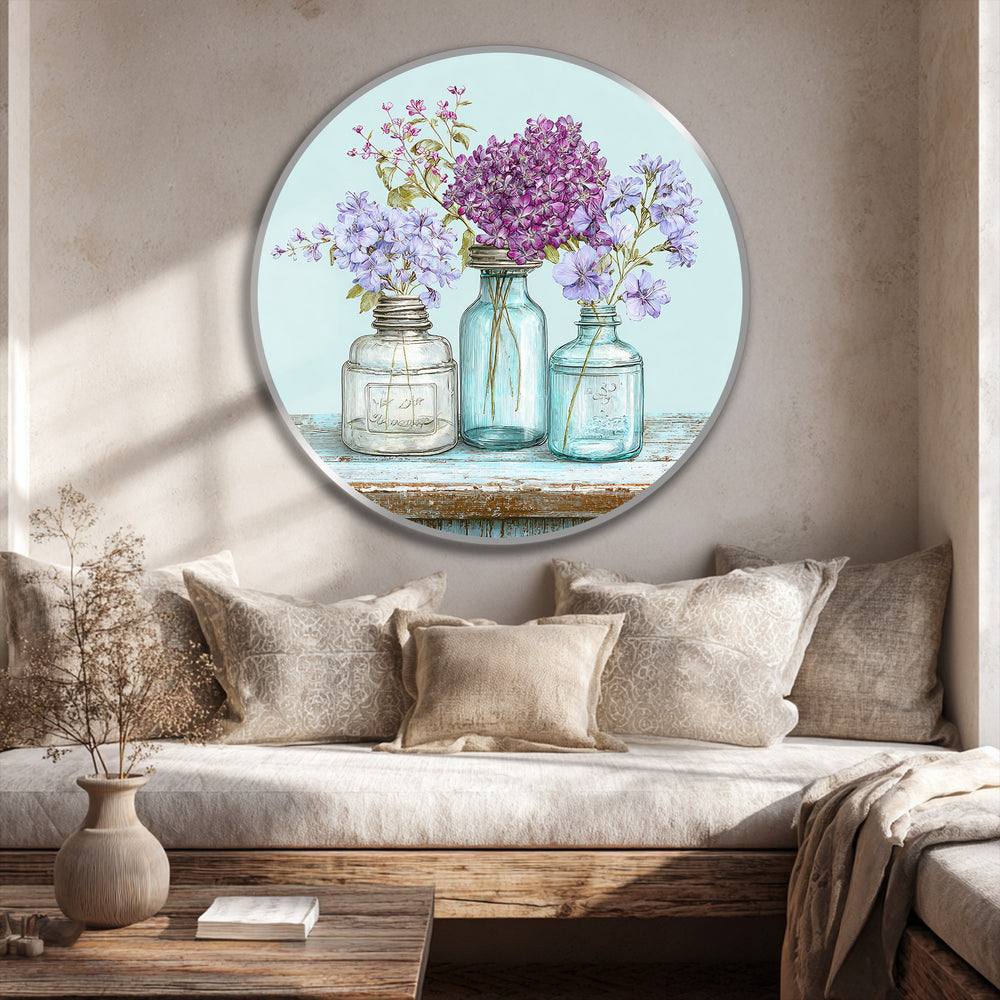 Light plays across the round oil painting decoration, highlighting the pastel wildflower jars with soft shadows enhancing its home decor appeal.