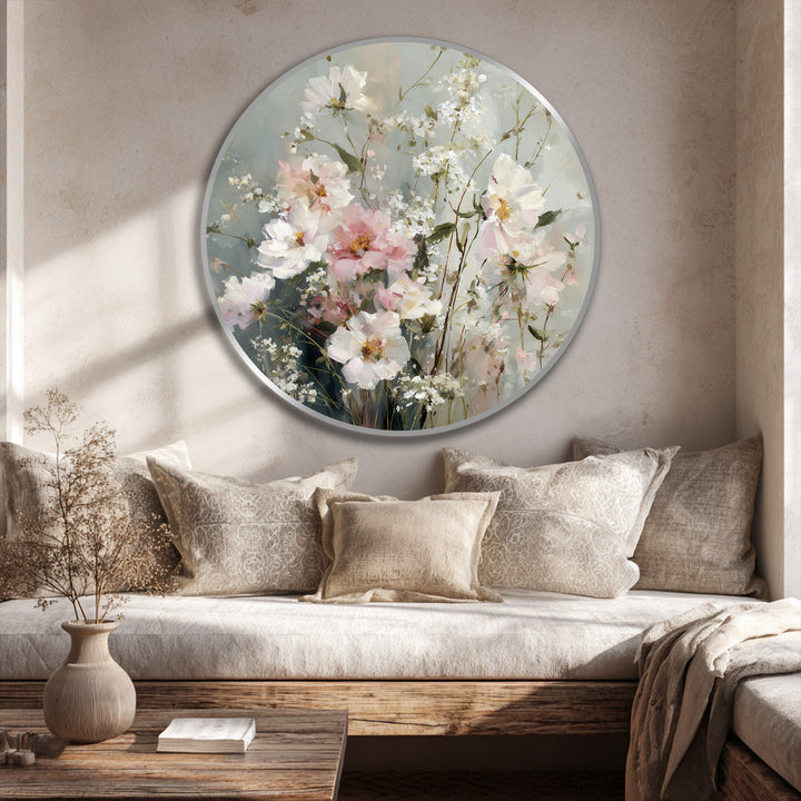 Subtle negative space highlights the round oil painting artwork featuring soft pastel wildflowers in bloom, creating an elegant and calming visual display.