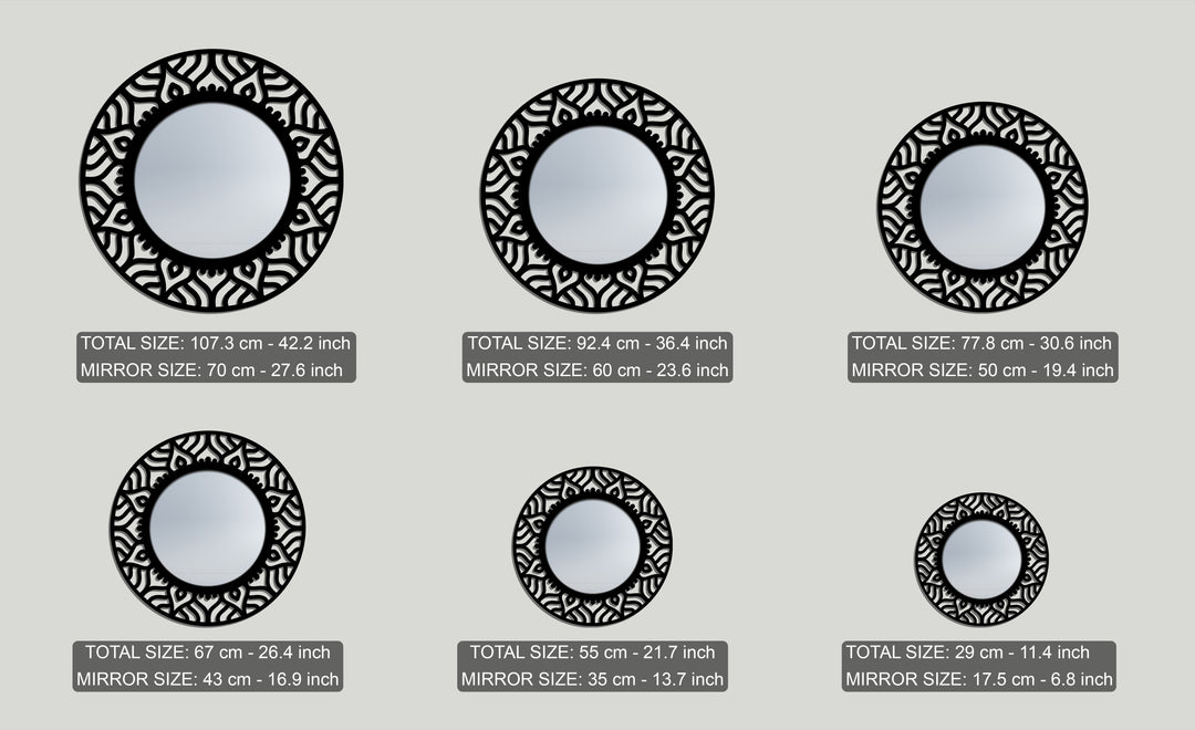 Soft, diffused reflections grace these decorative mirrors, showcasing abstract patterns within ornate black metal frames in varying sizes.