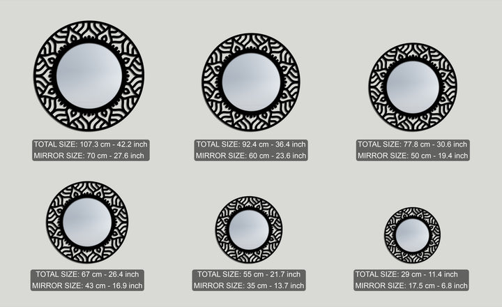 Soft, diffused reflections grace these decorative mirrors, showcasing abstract patterns within ornate black metal frames in varying sizes.