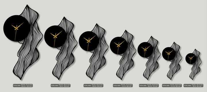 Flowing abstract leaf design on this unique metal wall art captures dynamic movement with its undulating black forms and gold-handed clocks.