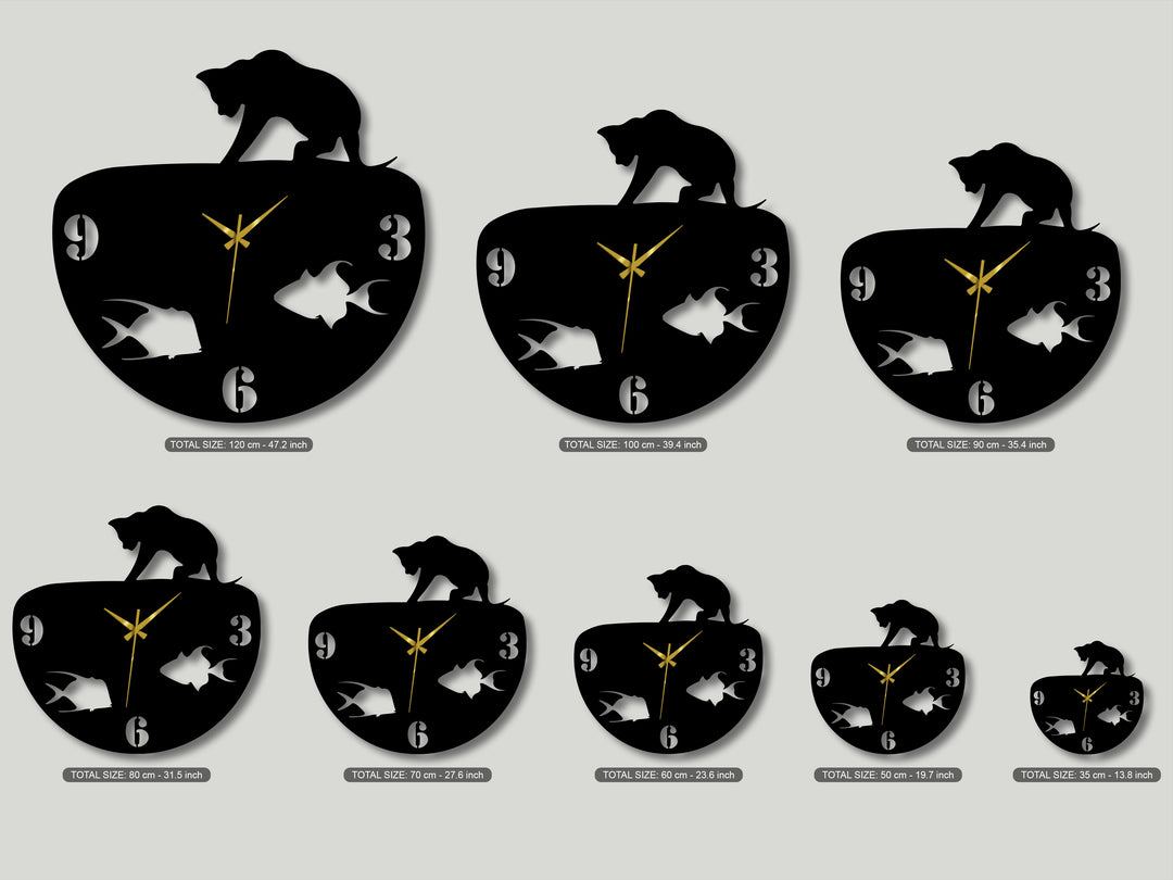 High color contrast defines the black cat and fish bowl metal art for wall clocks, with white numbers and gold hands on a light backdrop.