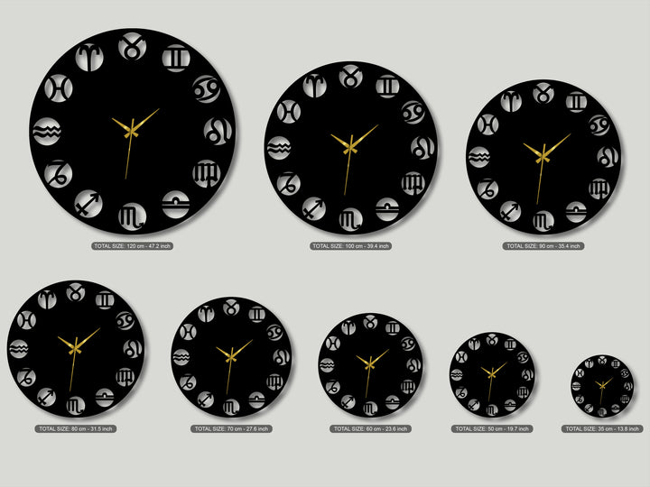 The stark black of the unique metal wall art zodiac clocks dramatically contrasts with the bright gold hands and light grey background in this astrology design.
