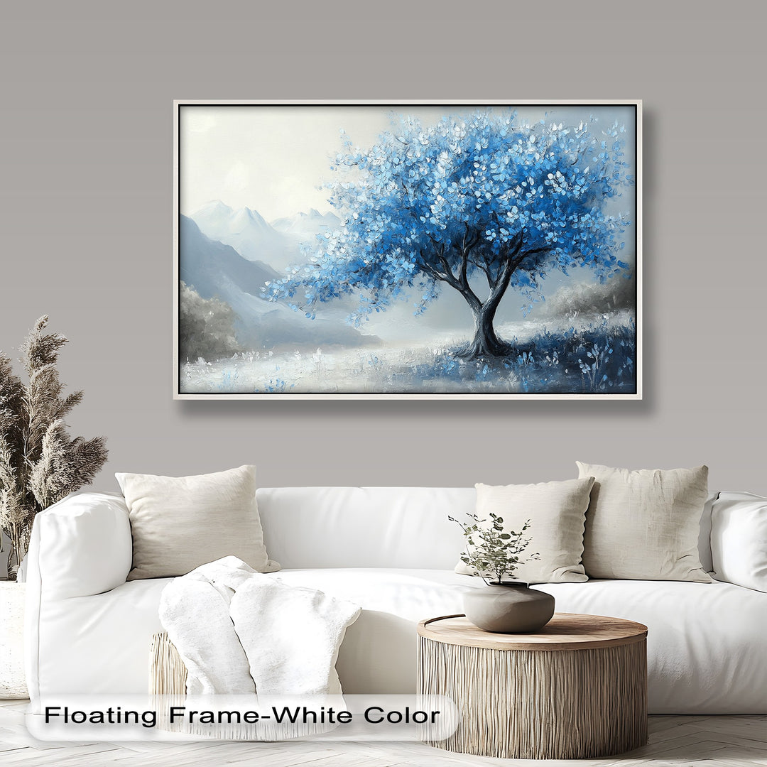 Dreamlike blue tree against misty silver mountain backdrop.

