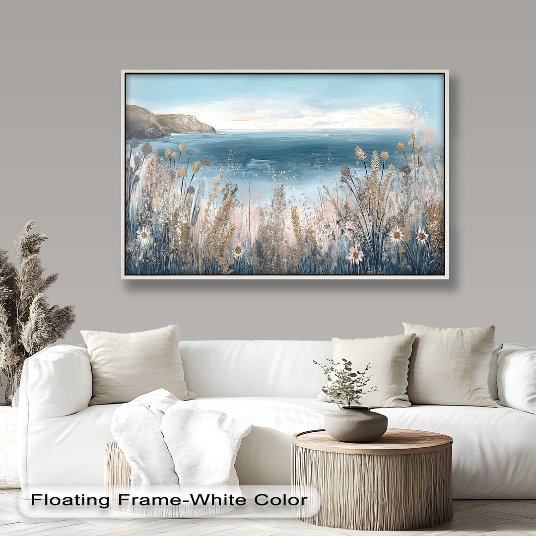 This dreamy coastal painting features wildflowers and tall grasses swaying in the breeze, framing a tranquil view of the sea and distant cliffs.