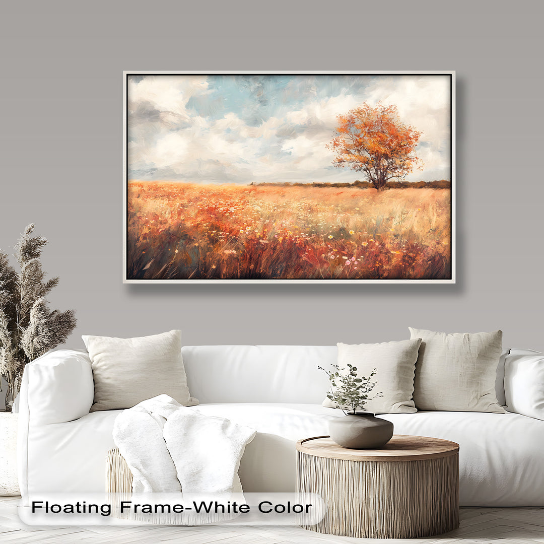 Golden autumn field painting with wildflowers and a lone tree.
