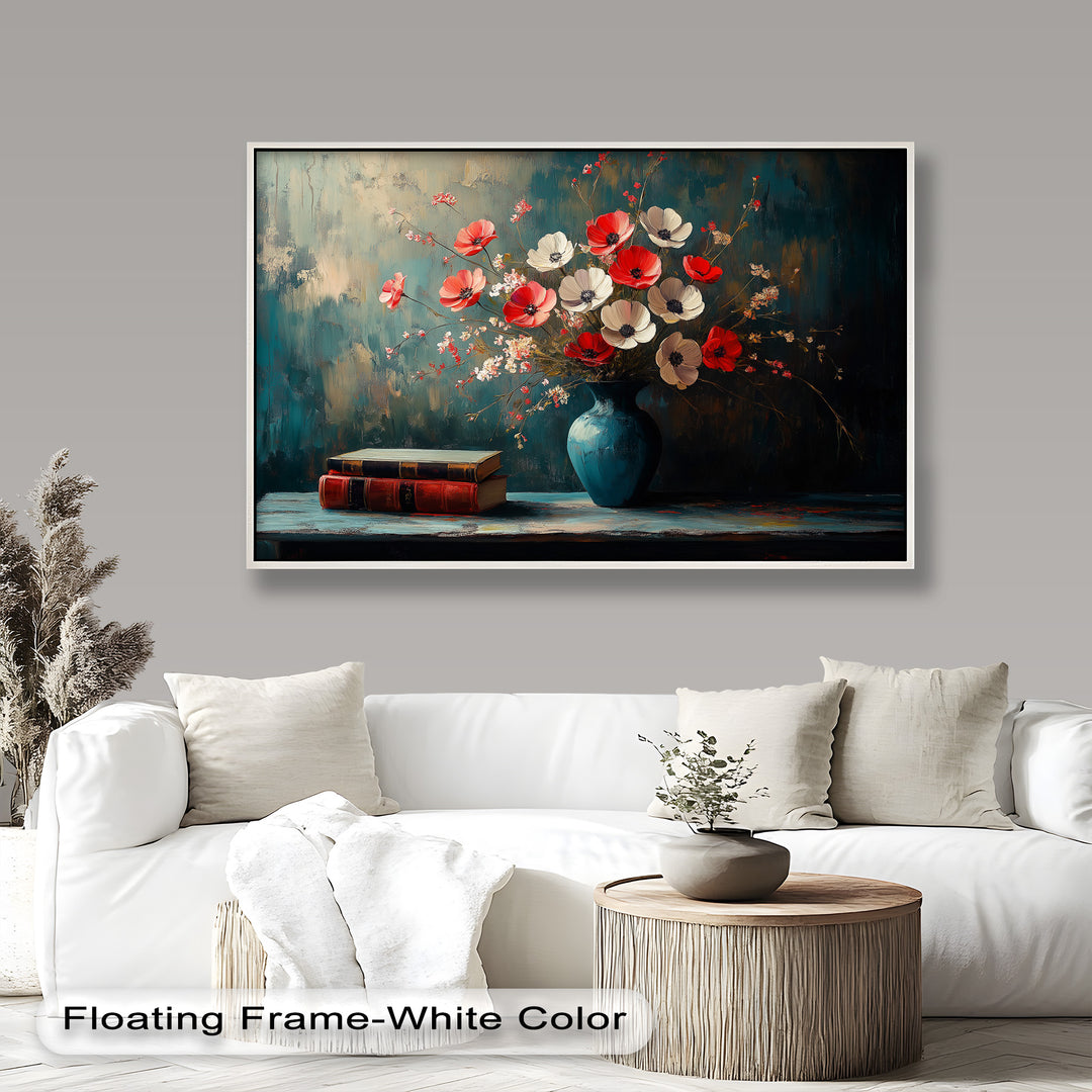 Vibrant floral arrangement with red and white blossoms in a teal vase.
