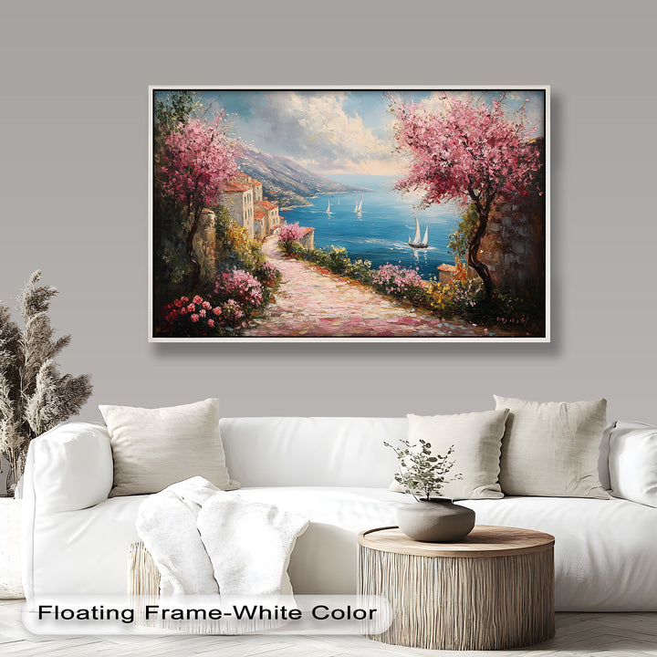A breathtaking Mediterranean coastal scene unfolds in this vibrant painting, where a sunlit cobblestone path lined with pink blossoms leads to an endless blue sea dotted with elegant sailboats.