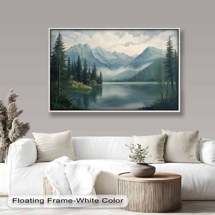 A peaceful forest lake nestled at the base of majestic, snow-dusted mountains with morning mist rolling in.

