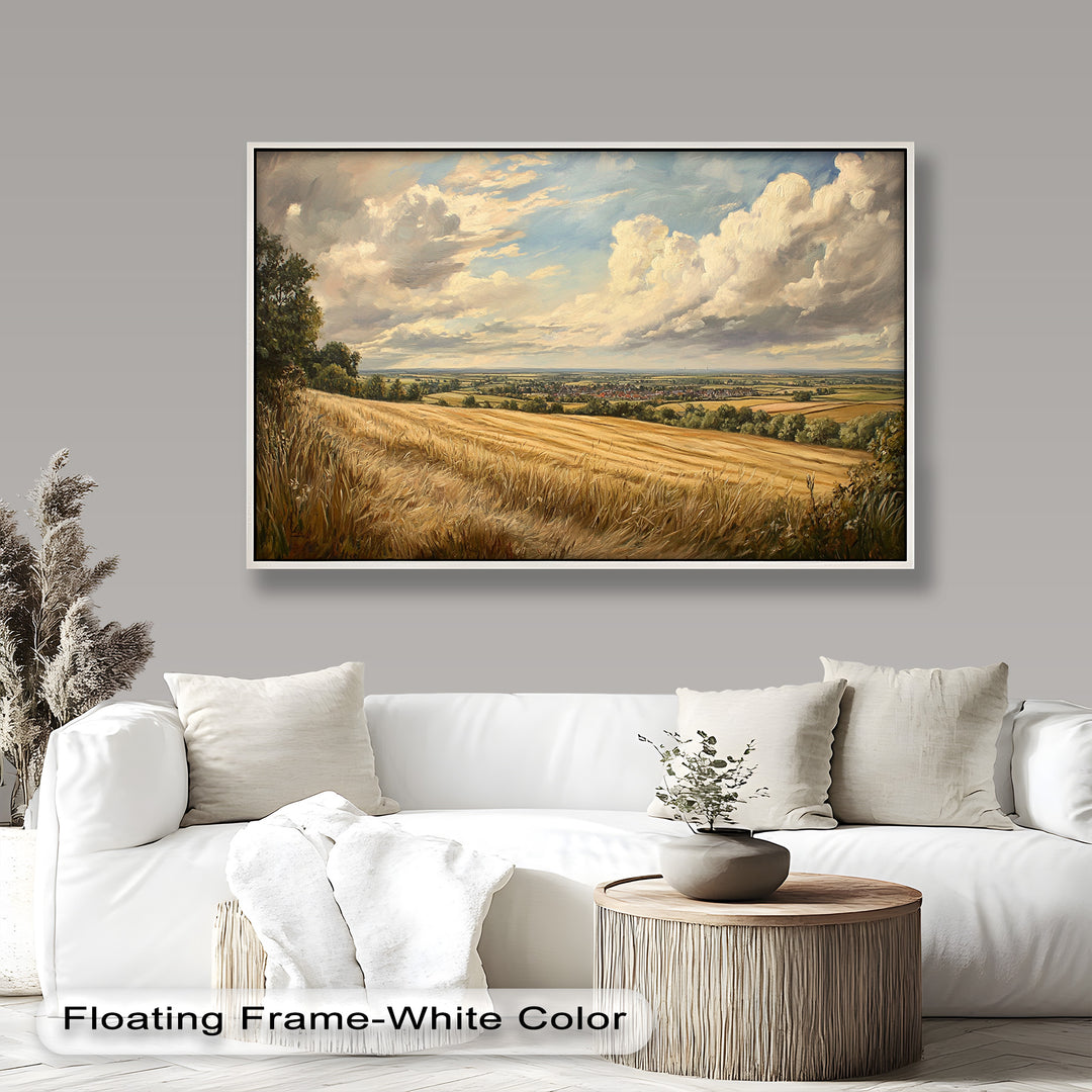 Golden wheat field overlooking a peaceful village under expansive skies.
