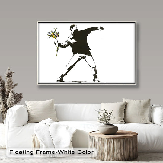 The dynamic transition between colors emphasizes the Flower Thrower oil painting artwork, an iconic protest Banksy image, blending black and white with muted floral tones.