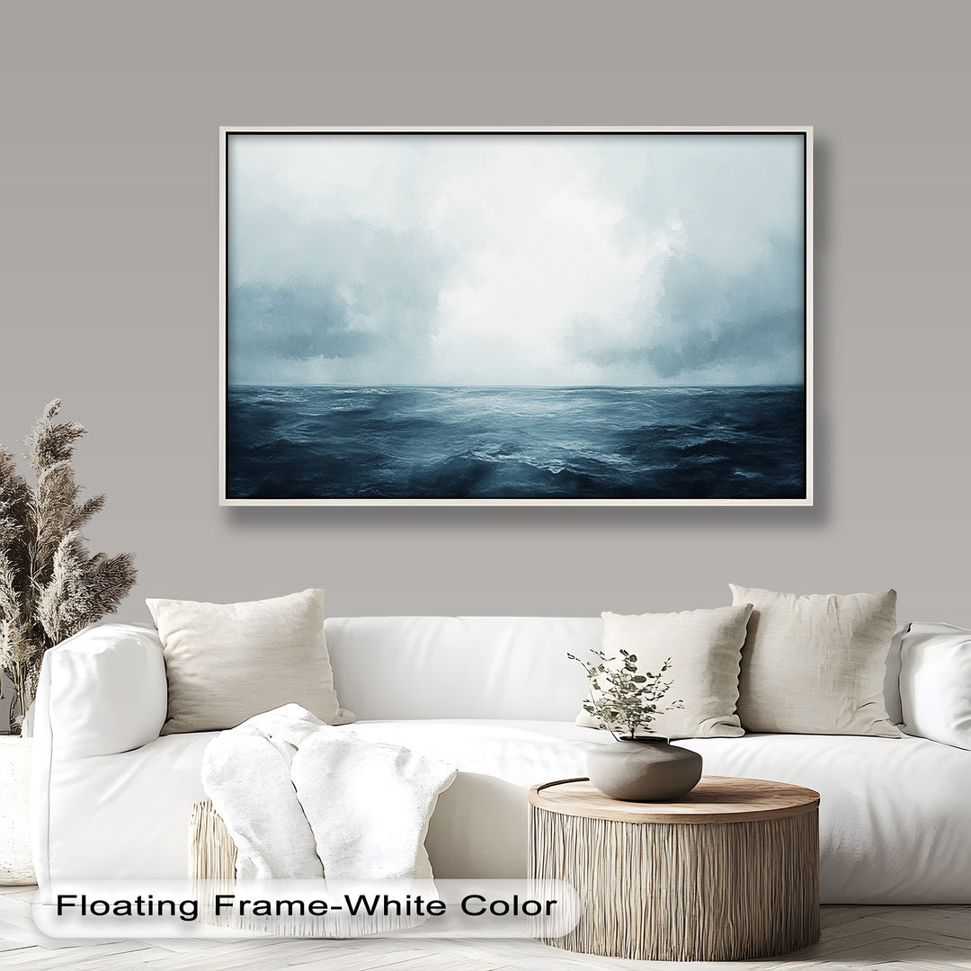 Minimalist ocean horizon with misty sky and soft blue waves.
