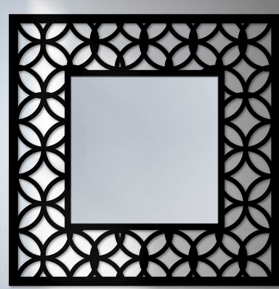 Illuminated with gleaming light, this modern mirror reflects the geometric frame, an interlocking circle pattern creating unique decorative metal art.