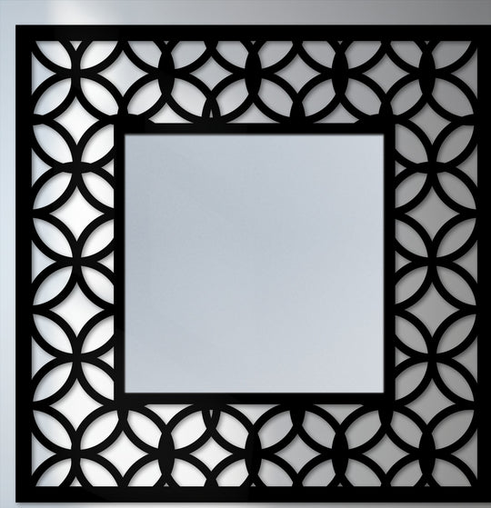 Illuminated with gleaming light, this modern mirror reflects the geometric frame, an interlocking circle pattern creating unique decorative metal art.