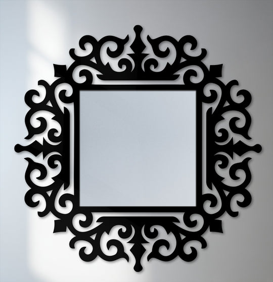 Elegant modern mirror features a square glass center surrounded by a black ornate baroque metal frame with a royal scroll design as eye-catching metal wall decor.