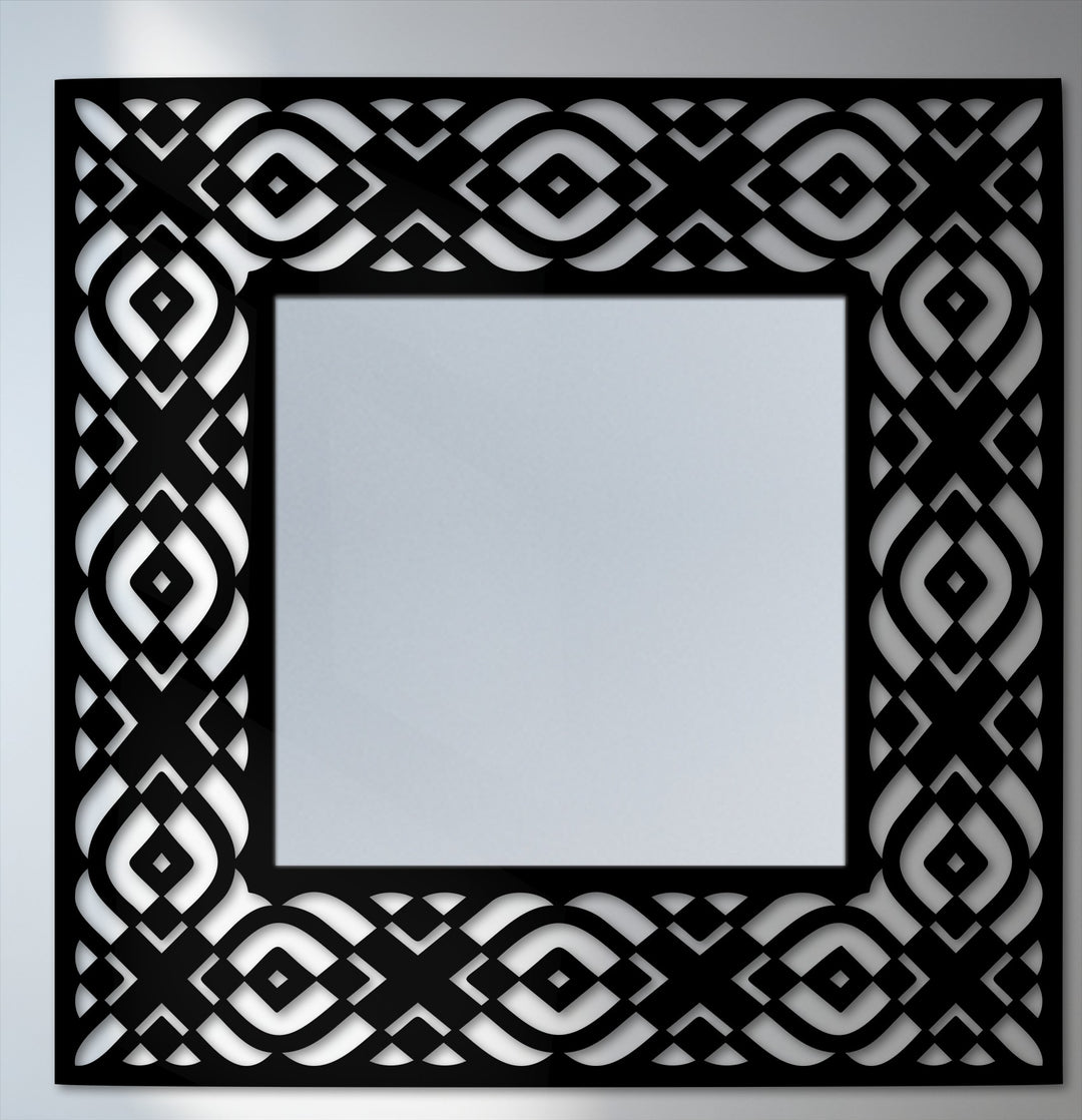 The focal point is the striking geometric tribal pattern frame surrounding this modern square floor decorative mirror, enhancing its visual appeal.
