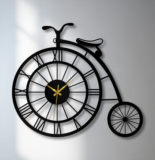 Highlighting the darkest area, this vintage penny-farthing bicycle metal wall clock offers a striking silhouette and serves as unique metal wall decor.